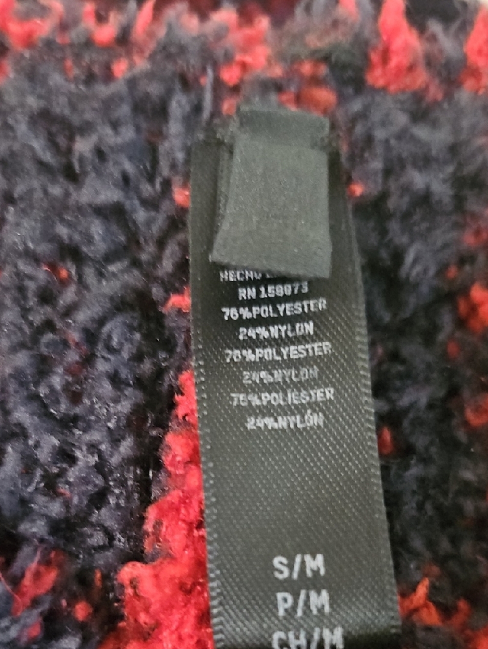 SKIMS Cozy Knit Unisex Onesie in the red and black "Brick Buffalo Check" pattern - Picture 5 of 6
